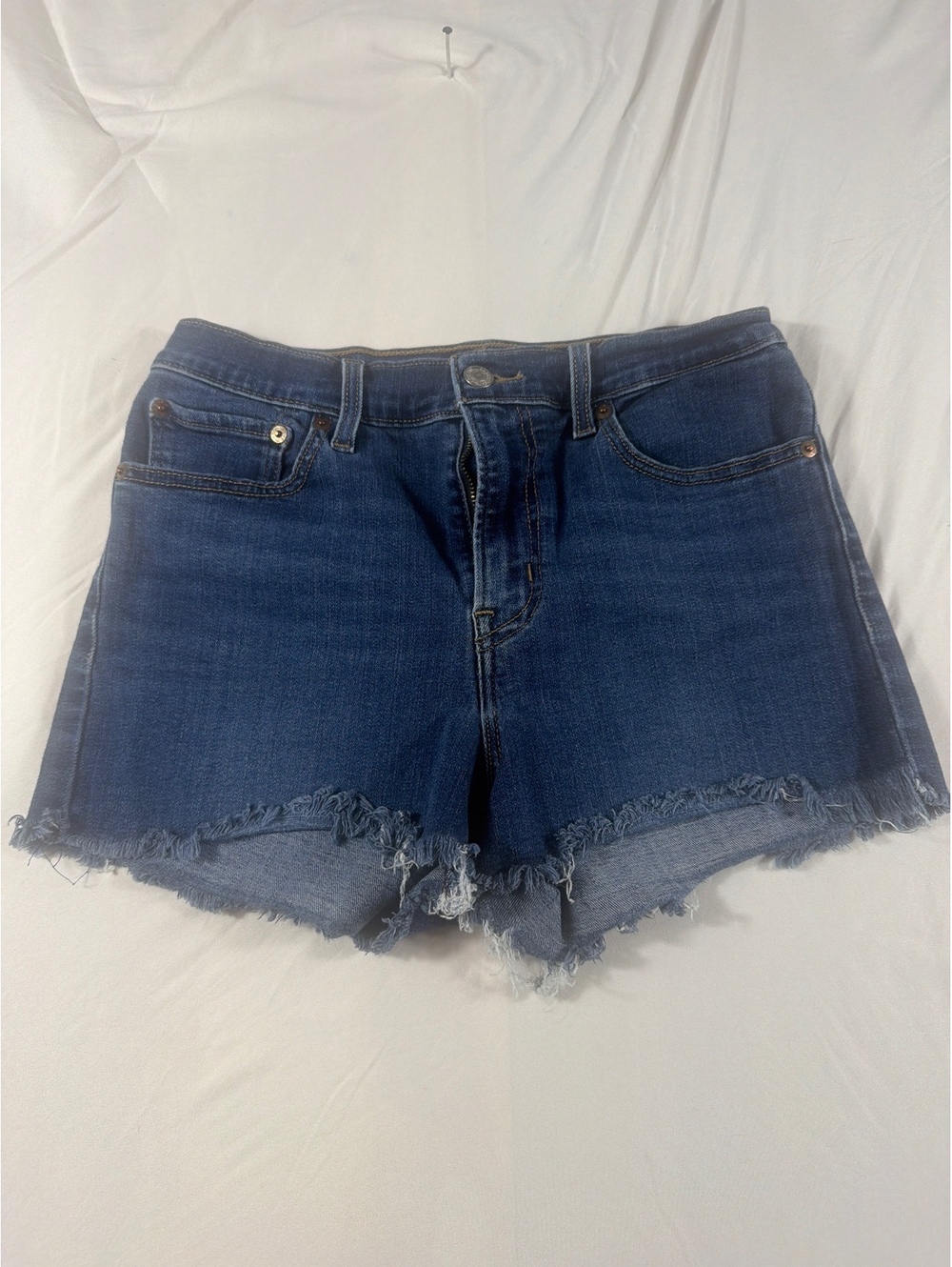 Levi's Blue Denim Cutoff Shorts with Frayed Hem